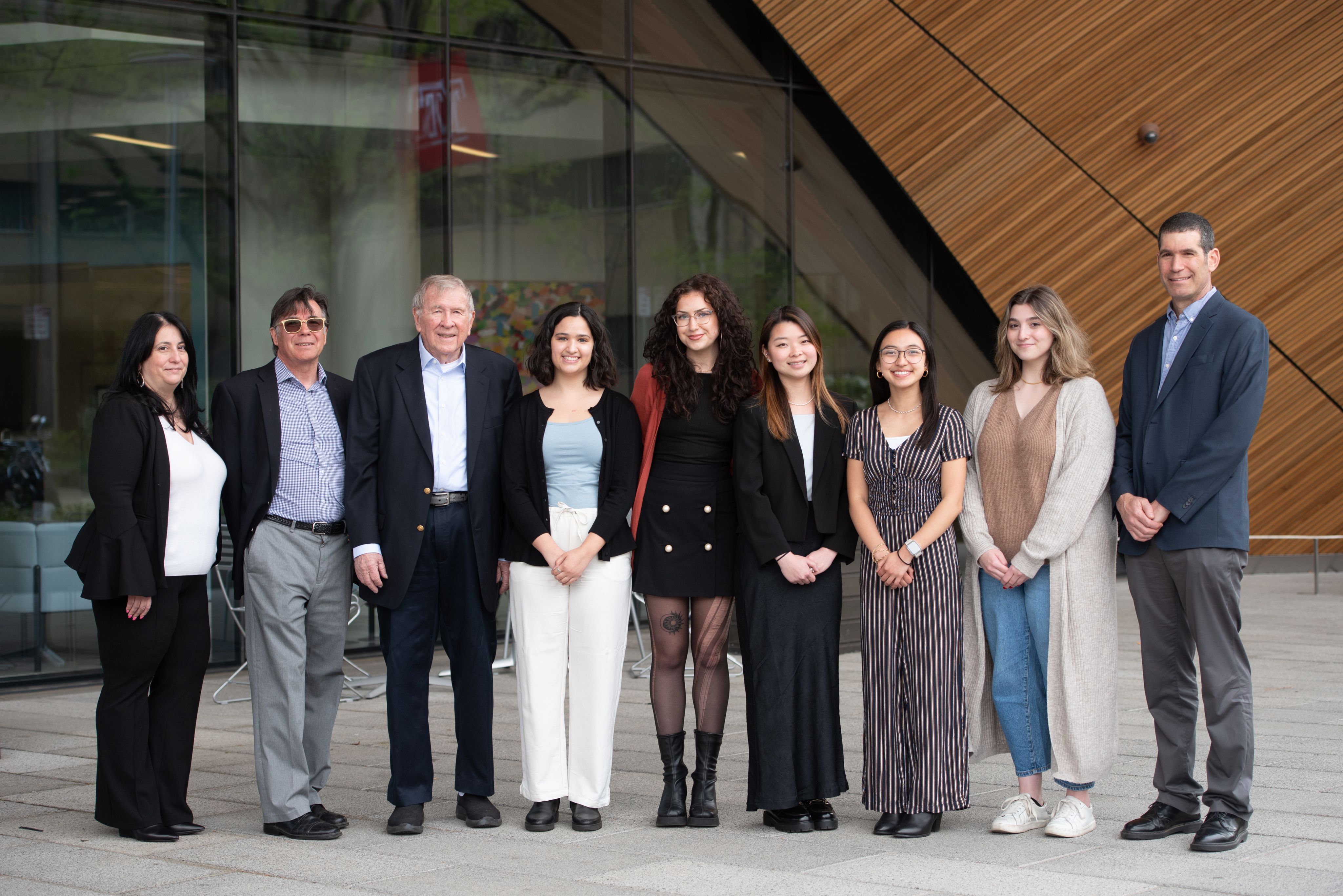 Jack Livingstone and the 2022–2023 Livingstone Undergraduate Research Award winners stand in front of Temple Libraries