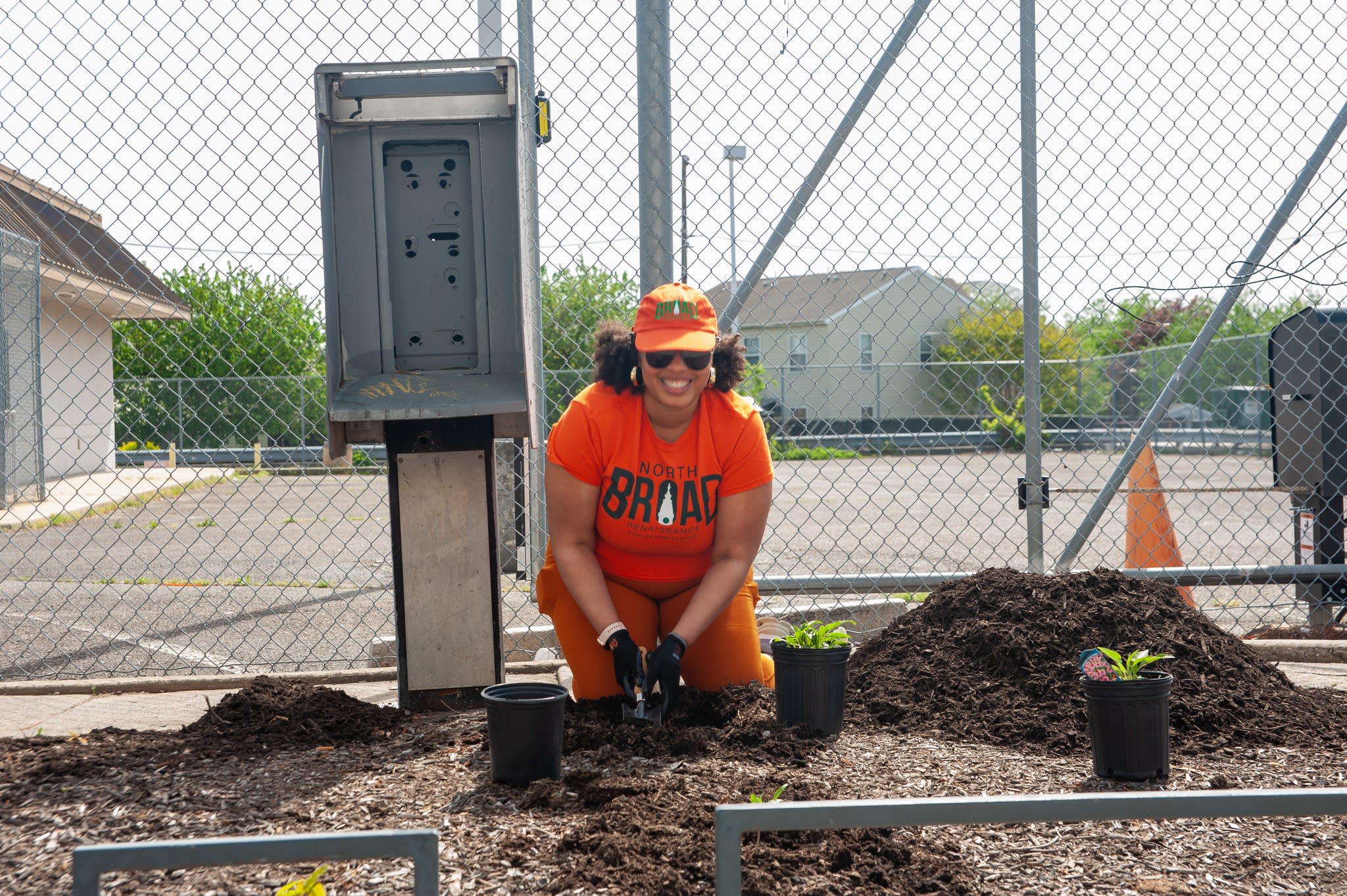 Shalimar planting plants in the ground